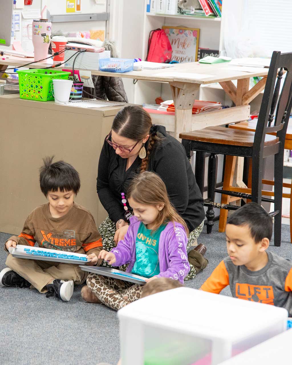 teacher-helping-students-portrait